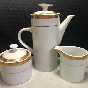 Stunning China coffee set by Lynne. Gorgeous gold trim. No chips or cracks.